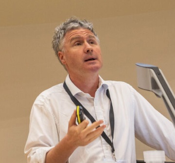 Photo of Prof. Ben Goldacre, taken at the Health And Care Analytics conference 2023, used by permission of The Strategy Unit.